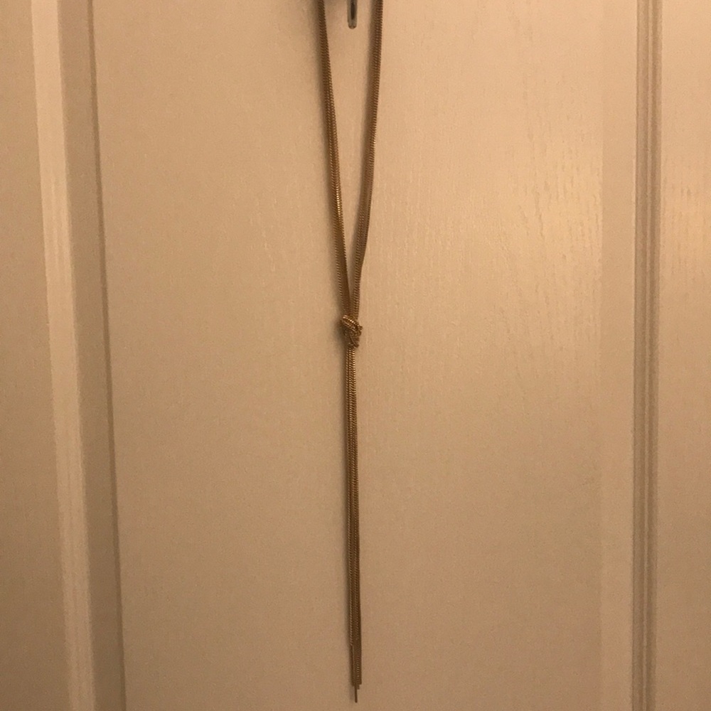 Long knotted gold loop necklace